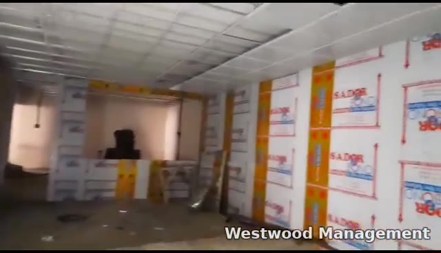 Data centre room in Addis Ababa during the works, with new wall cladding and suspended ceiling